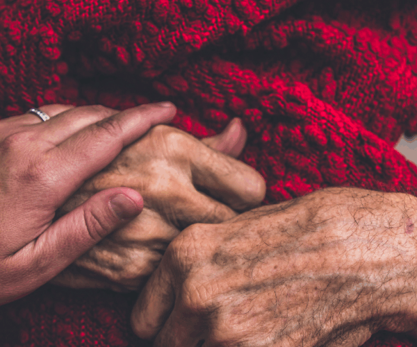 hospice care, old hands young hands